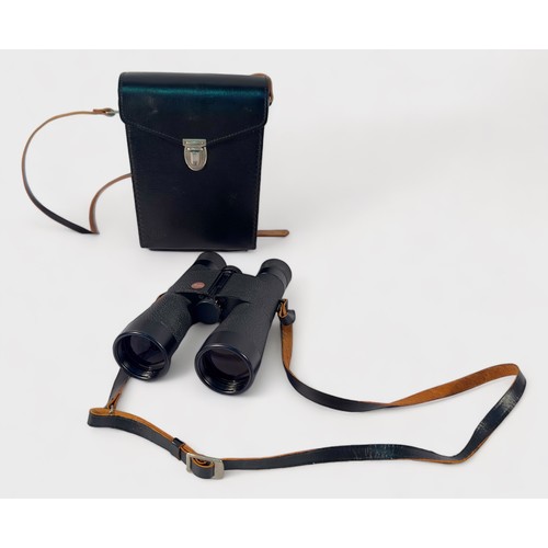 492 - A pair of Leitz 7 x 42B 140m/1000m Trinovid binoculars, stamped and numbered ‘Portugal 849972’, in o... 