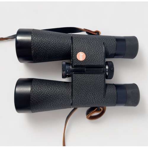 492 - A pair of Leitz 7 x 42B 140m/1000m Trinovid binoculars, stamped and numbered ‘Portugal 849972’, in o... 