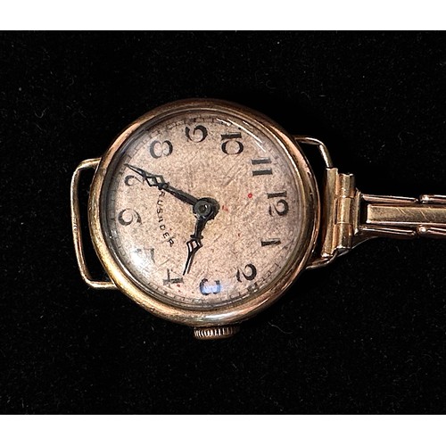 140 - A ladies vintage 9ct gold cased wristwatch, the silvered dial inscribed ‘Crusader’ and with Arabic n... 