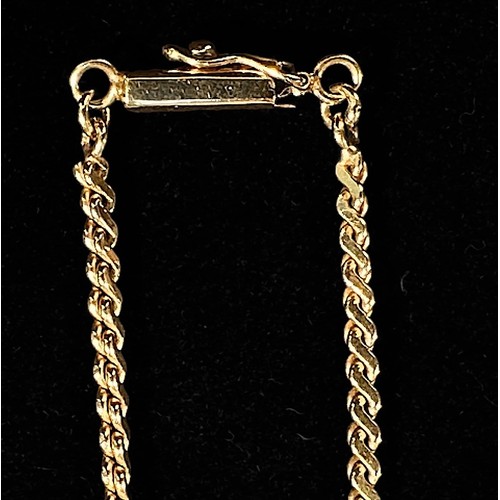 171 - A 14K gold necklace, of flat snake-link type with ribbon-loop pendant and open ends, sliding spring ... 