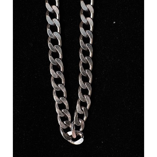 172 - A rhodium-plated 9k gold necklace, of flat curb link with spring hook fastening, 26.22g