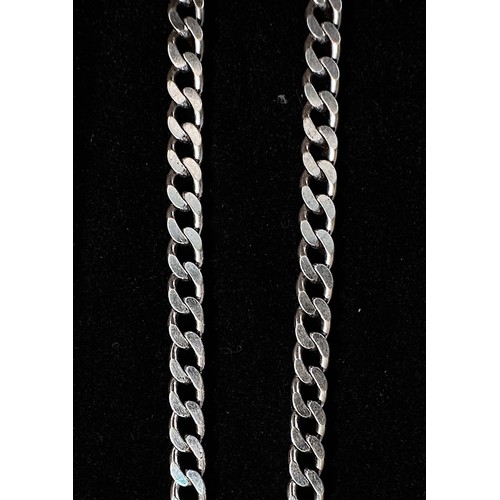 172 - A rhodium-plated 9k gold necklace, of flat curb link with spring hook fastening, 26.22g