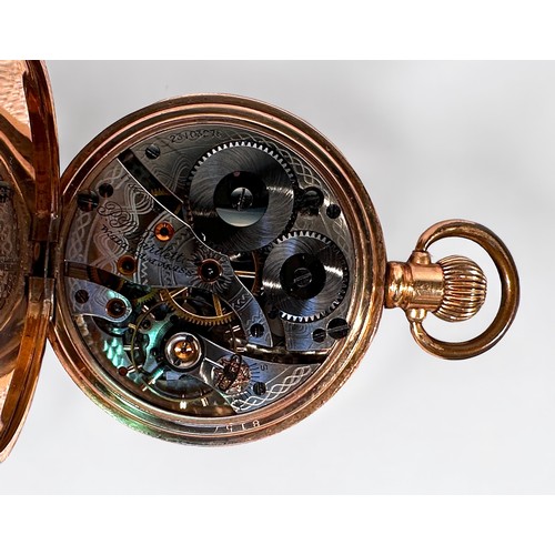 135 - A gold-plated open-face pocket watch by Waltham USA, the white enamel dial with retailers mark for ‘... 