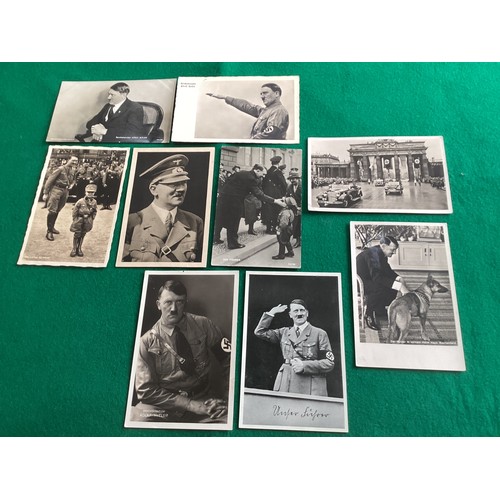 305 - A collection of some 31 German cards – nine showing Adolf Hitler (one has two noticeable creases), o... 