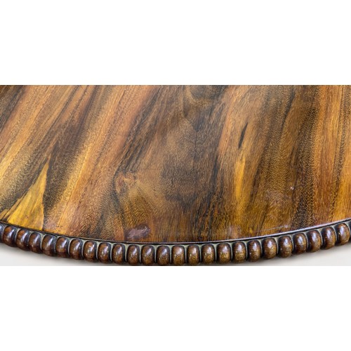 613 - A William IV rosewood breakfast table, the circular tilt-top with beaded edge and brass locking mech... 