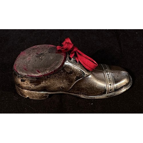 107 - A George V silver novelty pin cushion, modelled as a laced shoe with wooden sole, by Solomon Blancke... 