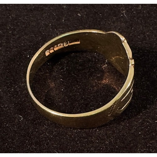 220 - A 9ct gold ring modelled as a belt with buckle, gross weight approximately 5g