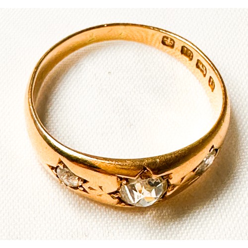 187 - An 18ct yellow gold dress ring, star set with three Victorian cut diamonds, estimated total diamond ... 