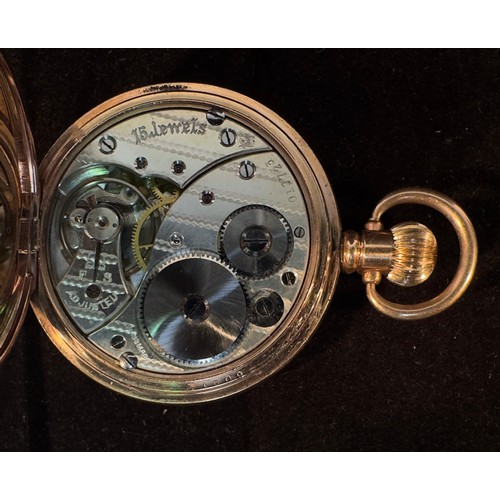 147 - A 10ct gold-plated half-hunter pocket watch by Kendal & Dent, London, Makers to the Admiralty, the w... 