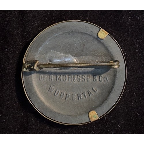 529 - A Winterhilfswerke (WHW) 1935-1936 badge, inscribed to back 'Dr. R. Morisse & Co. 'Wuppertal'. 3cm d... 