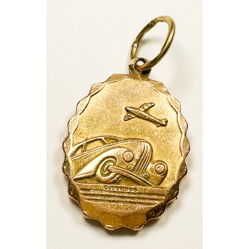 195 - A solid 9ct yellow gold oval shaped St Christopher pendant, with wave design edge, and large round b... 