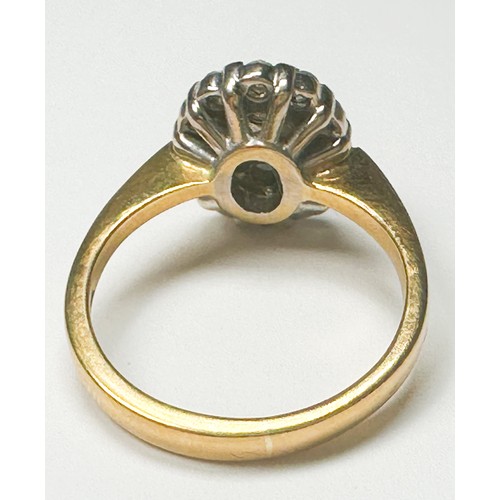 202 - An 18ct yellow gold dress ring, claw set with 19 round brilliant cut diamonds in an oval-shaped tier... 