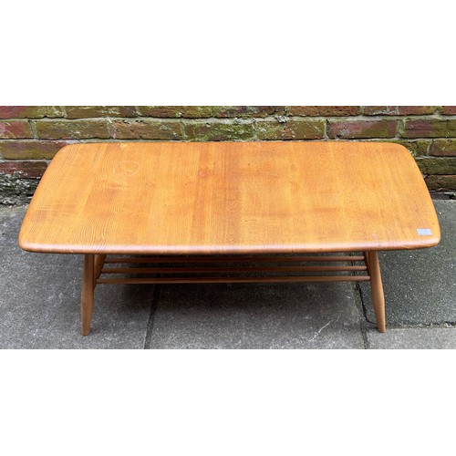 605 - An Ercol blonde elm Windsor low coffee table, model no. 459, of rectangular form, with rounded corne... 