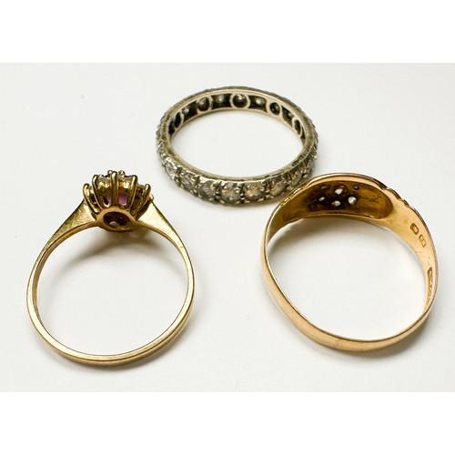 205 - An 18ct yellow gold dress ring, set with small white stones to centre, (one missing), hallmarked Che... 