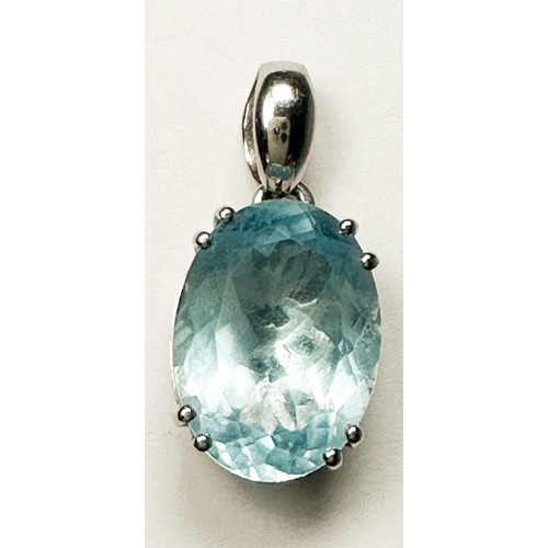 227 - An 18ct white gold pendant, set with an oval faceted blue topaz, measuring 15mm x 11mm, suspended on... 