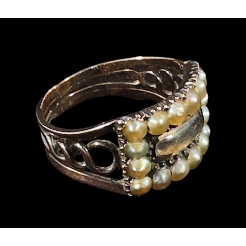 246 - A yellow metal, tests as 9ct gold or above Georgian mourning ring, with a locket of hair to the cent... 