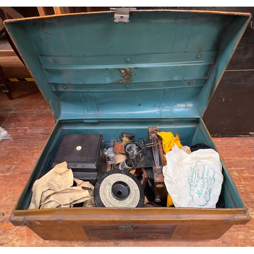 494 - A metal trunk containing various box camera peripherals, including The Westminster Photographic Exch... 