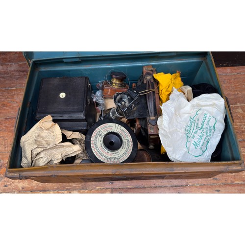 494 - A metal trunk containing various box camera peripherals, including The Westminster Photographic Exch... 