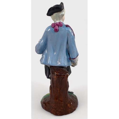 45 - An 18th century Bow Porcelain Figure of a young man emblematic of Spring and holding a basket of flo... 