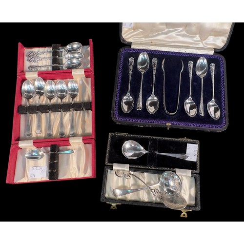 112 - An Edwardian cased set of six coffeespoons and sugar tongs, Sheffield, 1906, a cased set of eight co... 