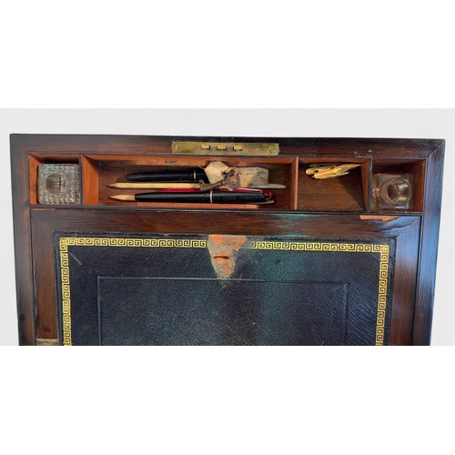 360 - A Victorian burr walnut writing slope, the domed hinged top with brass inlay and matched flush brass... 