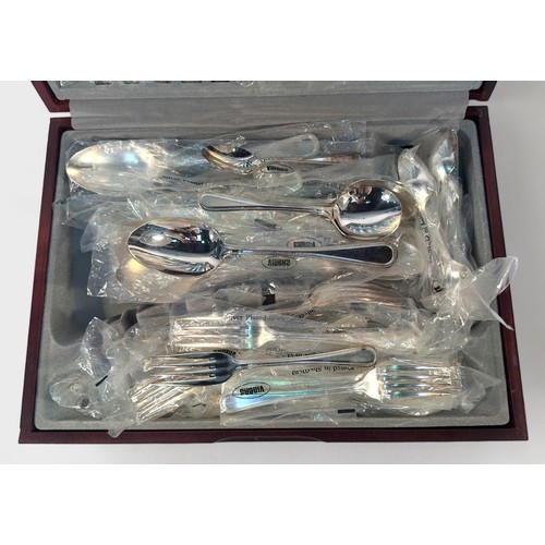 120 - A canteen of Viners silver-plated cutlery, with beaded decoration, housed in branded, fitted and lin... 