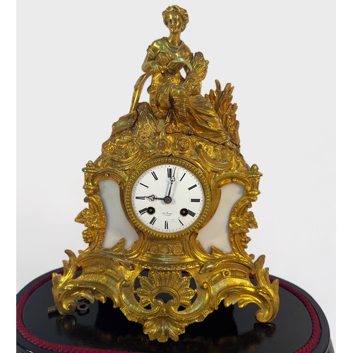 506 - A 19th Century French gilt-spelter mantel clock by Henry Marc, Paris, the white enamel dial with Rom... 