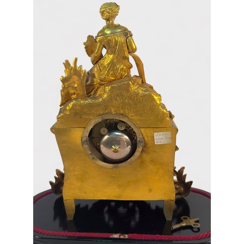 506 - A 19th Century French gilt-spelter mantel clock by Henry Marc, Paris, the white enamel dial with Rom... 