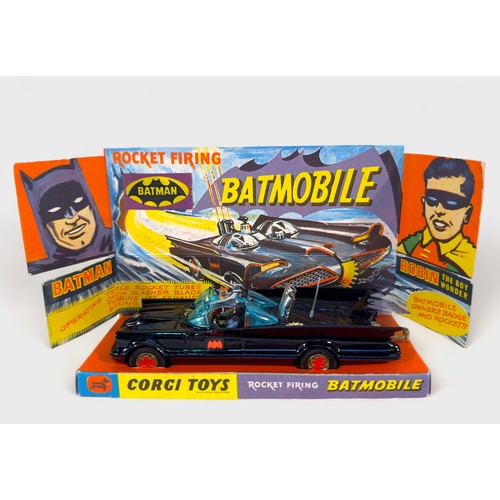 457 - A boxed Corgi Toys ‘267’ Rocket Firing Batmobile with Batman and Robin, including card display stand... 