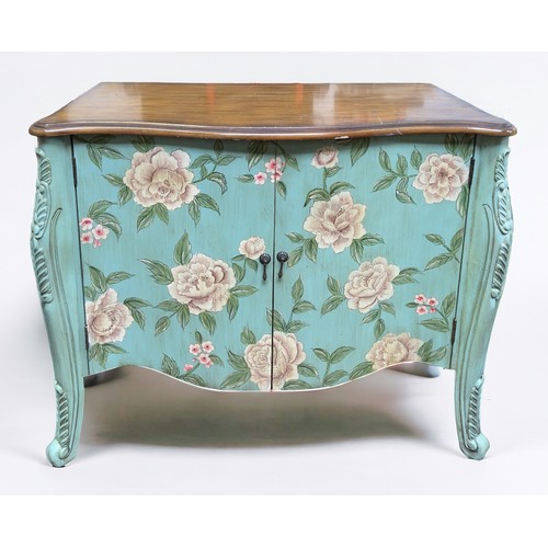 620 - A Continental commode cupboard, of serpentine form, the walnut top above a floral painted aqua blue ... 