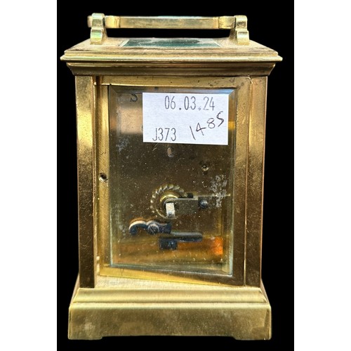 507 - A Brass Cased Carriage Clock, with French spring-driven 8-day movement, white enamel dial with Roman... 