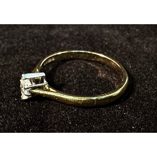 253 - An 18ct gold ring, centrally claw set with a solitaire marquise diamond, estimated diamond weight 0.... 