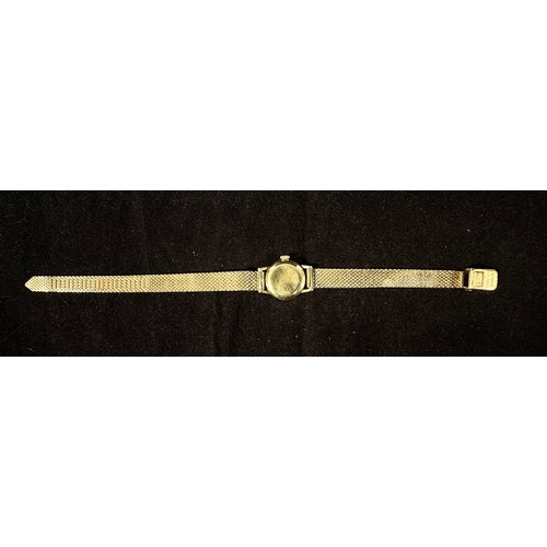 152 - An 18ct gold cased ladies wristwatch by Roamer, the silvered dial with batons denoting hours, on gol... 