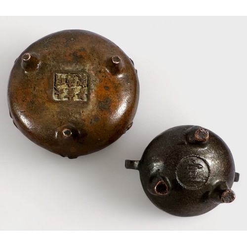 59 - Four assorted Chinese copper alloy items, comprising, cast figures of a mother toad with baby on her... 