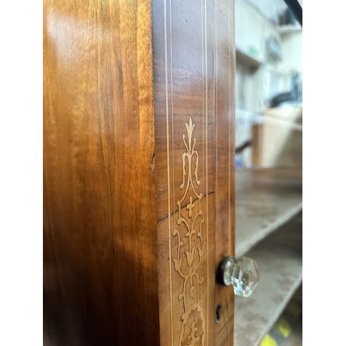 609 - A Victorian inlaid walnut pier cabinet, with single central glazed door enclosing three shelves, rai... 