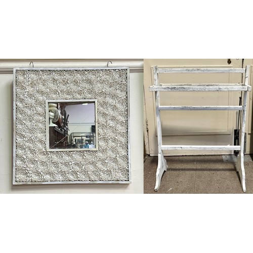 530 - A clam shell 'valentine' mirror, the shells applied as white carnation flowers around a square looki... 