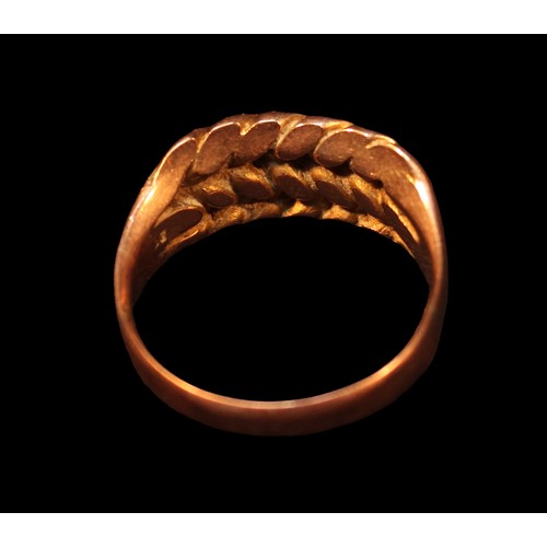 146 - A 9ct gold keeper ring, gross weight approximately 5.1g