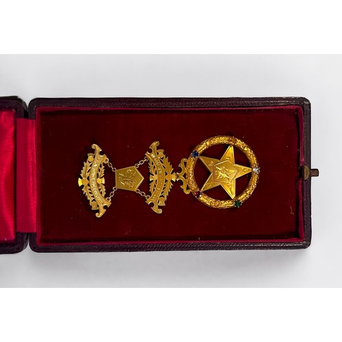 149 - An 18ct gold Masonic jewel, awarded by the Chap. Abbotsford No.14 lodge and to Bro. Jas. Meikle, W.P... 