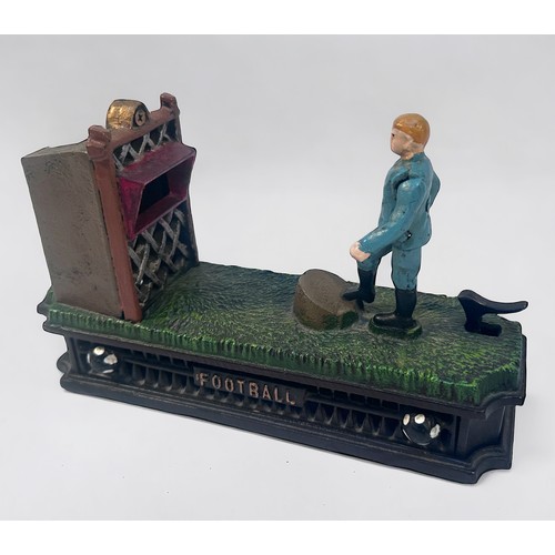 324 - A painted cast iron novelty mechanical money bank or box, Football Bank, modelled as a footballer ta... 