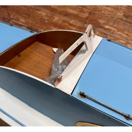 458 - An Aerokits 'Sea Queen' cabin cruiser model boat, fitted with motor, blue and white, 118cm long