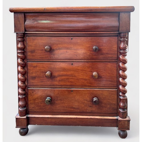 626 - A Victorian mahogany chest of three long, graduated drawers with turned pulls and pulvinated frieze ... 