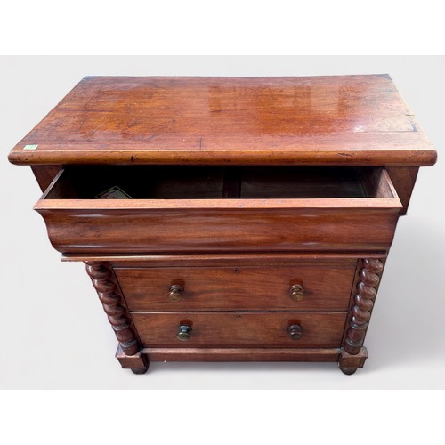 626 - A Victorian mahogany chest of three long, graduated drawers with turned pulls and pulvinated frieze ... 