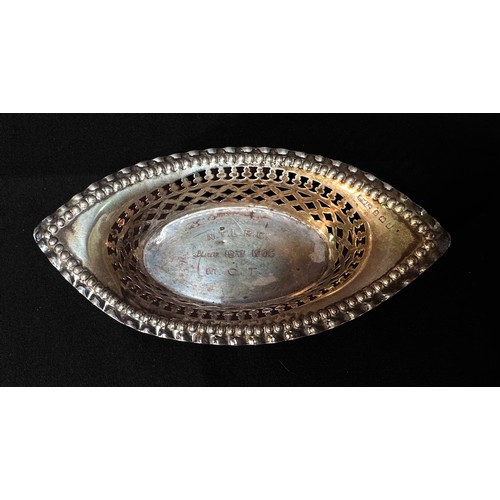 79 - A Victorian silver pin dish with fourteen-petal rim and inset with a George II silver sixpence dated... 