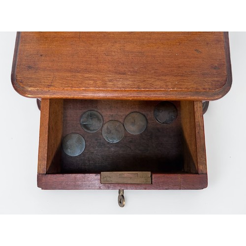 346 - A Late 19th Century walnut Cox's Patent Till, with glass panel and sliding penny-drop, hinged door  ... 