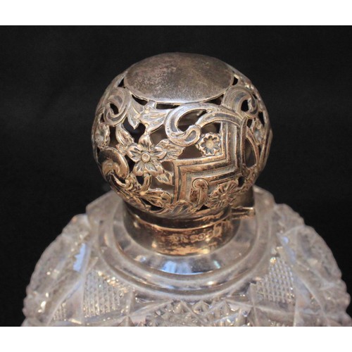 74 - A late Victorian silver-mounted large cut-glass perfume bottle, of compressed blobular form, with  g... 