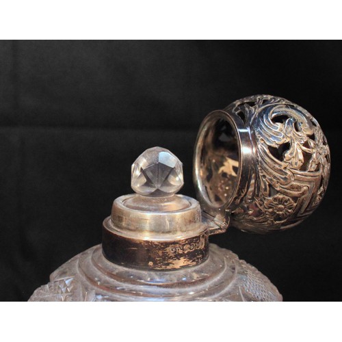 74 - A late Victorian silver-mounted large cut-glass perfume bottle, of compressed blobular form, with  g... 