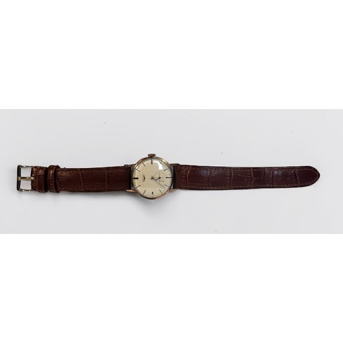 119 - A vintage 9ct gold gents Longines wristwatch, C.1950’s, the silvered dial with batons denoting hours... 