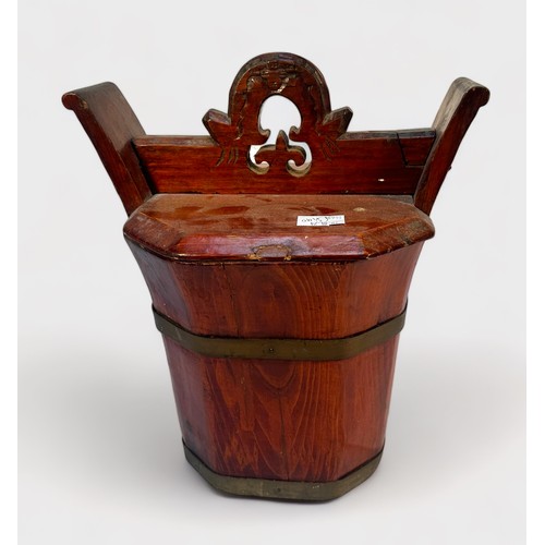 374 - A Chinese coopered oval wooden barrel with detachable baby-bath top, together with a coopered wooden... 