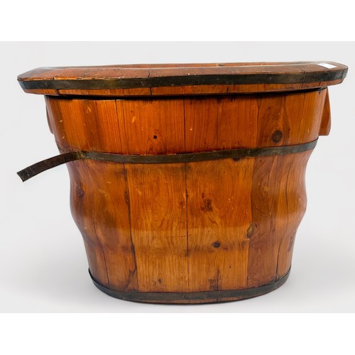 374 - A Chinese coopered oval wooden barrel with detachable baby-bath top, together with a coopered wooden... 