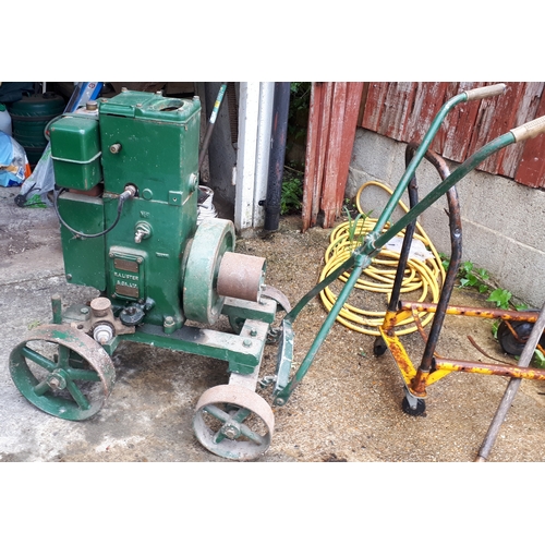 384 - A Lister stationary petrol engine, manufactured by R.A.Lister & Co Ltd, Dursley, England, with belt-... 